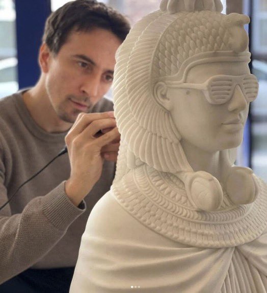 Leo Caillard working on sculpture